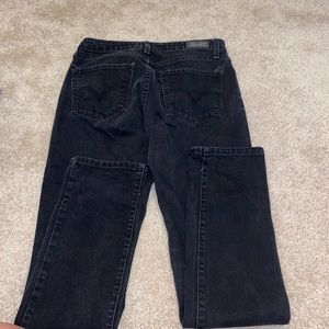 Levis mid rise skinny black denim pants size 29